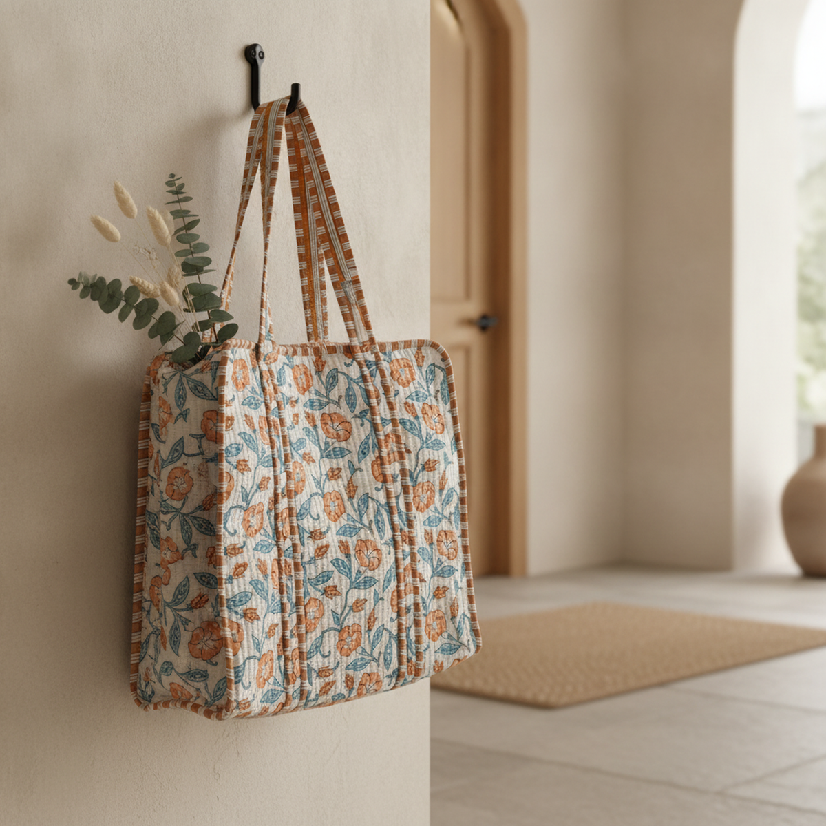 Spacious cotton tote bag with floral pattern and zipper closure.