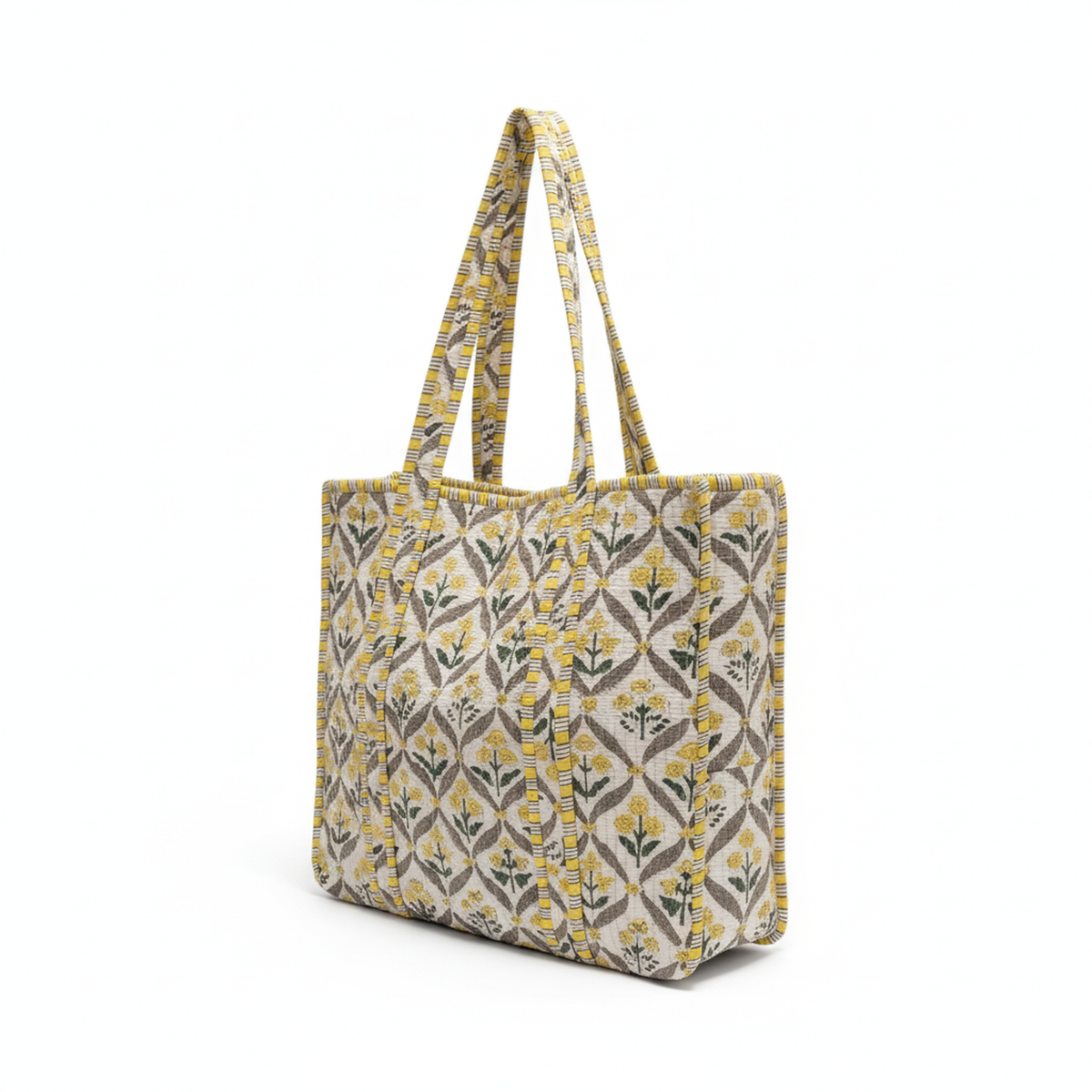 Ivory Quilted Tote Bag shown open, displaying its spacious interior, with two shoulder straps visible.
